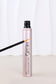 MERO Lash Growth Serum in a sleek pink tube with applicator, designed for nourishing and enhancing lashes.